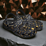Classic Clogs Gold and Black Skull Motifs